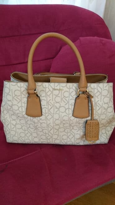 Canta zakaz alinib xaricden uc defe asaqi giymete satilir, unvan