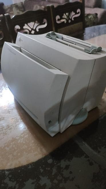 canon e414 printer: HP LaserJet 1000 lazer printeri, ofis və ya ev istifadəsi üçün nəzərdə — 1