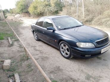 sumqayit opel oluxana: Model: Opel Omega sedan Kuzov: 4 qapı, tünd mavi rəng Nömrə — 4