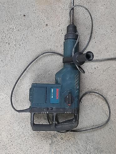 perforator bosch: Bosch GBH 11 DE – ağırbeton və daş səthlərində qırma və qazma üçün — 1