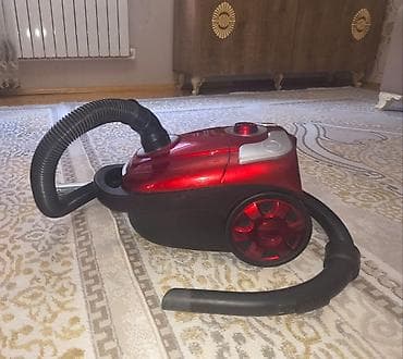 tost aparati: Qırmızı rəngli tozsoran – torbalı tip. Xüsusiyyətlər: - Güc: 3600 W — 2