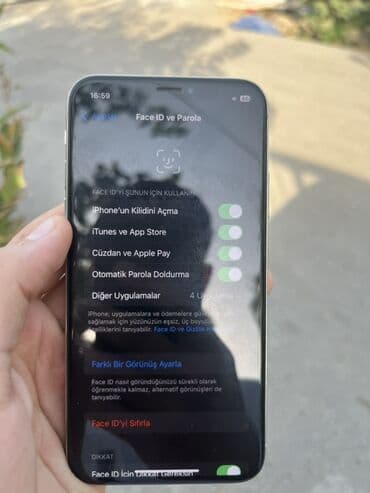 телефон fly fs504 cirrus 2: IPhone X, Серебристый, Face ID — 4