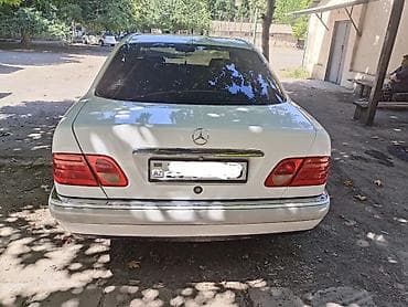 met: Mercedes-Benz E-Class: 2 l | 1996 il Sedan — 6