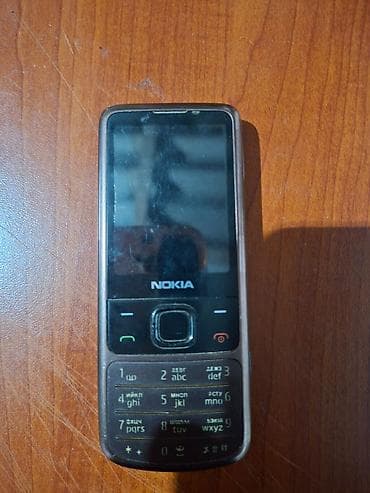 Nokia 6700 Slide, rəng - Qəhvəyi, Düyməli