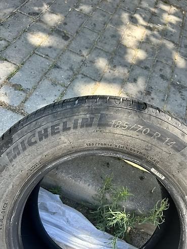 l200 disk: Michelin markalı avtomobil şini. Ölçüsü: **185/70 R14** Yük/sürət — 3