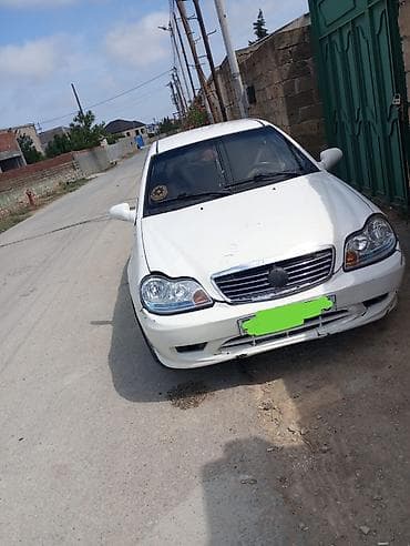 4 teker: Avtomobil: Chery QQ6 (sedan), ağ rəng Kuzov: 4 qapı, ön və arxa — 1