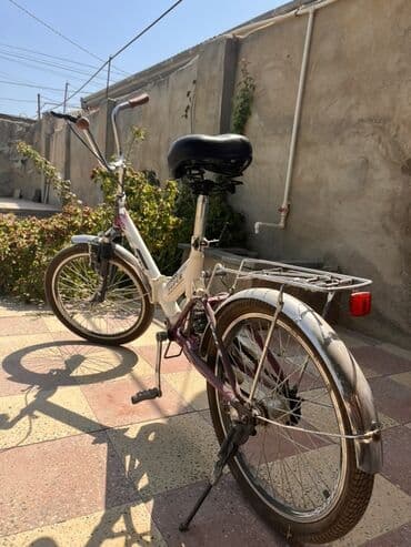 aurus велосипед: Stels markalı bu qatlanan velosiped ağ və bənövşəyi rəngdədir. Kiçik — 2