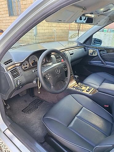 06 təkəri: Mercedes-Benz E 320: 3.2 l | 2000 il Sedan — 7