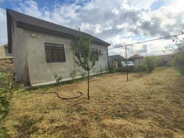 yevlaxda ev elanlari: Torpaq sahəsində yerləşən, yaşayış üçün yararlı ev satılır. Evin — 2