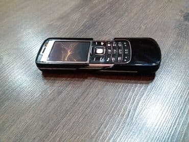 Apple iPhone: Qara rəngli sürüşdürülən düyməli mobil telefon Xüsusiyyətlər: - — 2