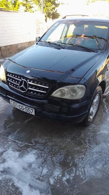 qar zinciri: Mercedes-Benz E 320: 3.2 l | 2000 il Ofrouder/SUV — 1