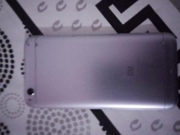 ТВ и видео: Xiaomi Mi 9, цвет - Серебристый, 
 Сенсорный — 2