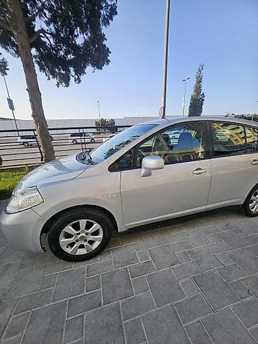 benzin bakı: Nissan Tiida: 1.6 l | 2008 il Sedan — 1
