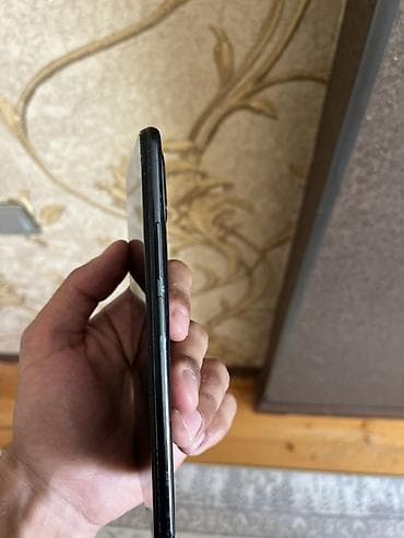 Мобильные телефоны и аксессуары: Xiaomi 11 Lite, 128 ГБ, цвет - Черный, 
 Отпечаток пальца, Две SIM карты, Face ID — 4