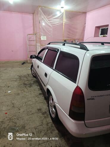 disk təkər type 0: Opel Astra Caravan (universal), ağ rəng - Kuzov: 5 qapılı universal — 2