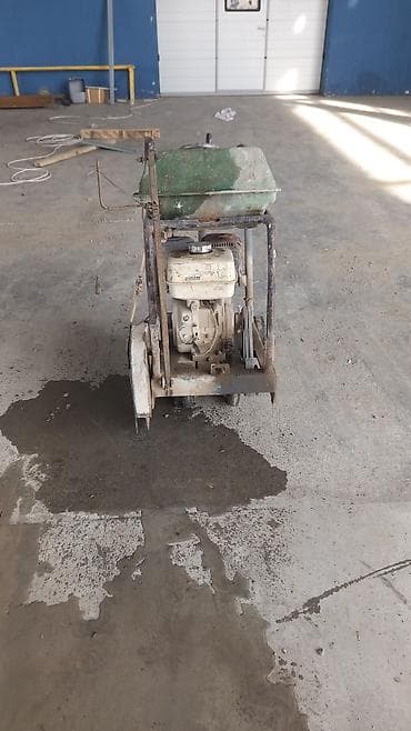Beton döşəmə işləmə avadanlıqları - Benzin mühərrikli beton kəsici