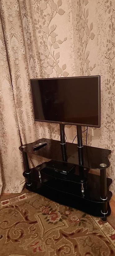 divar kitab refleri: LG televizor + şüşə TV stendi (dəst) Məhsulun tərkibi: - LG LED — 1