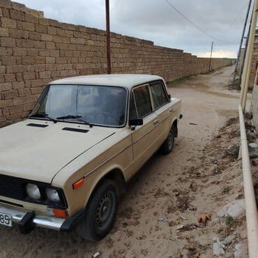 VAZ 2106 sedan - Kuzov: bej rəng, 4 qapı, xrom yan moldinqlər