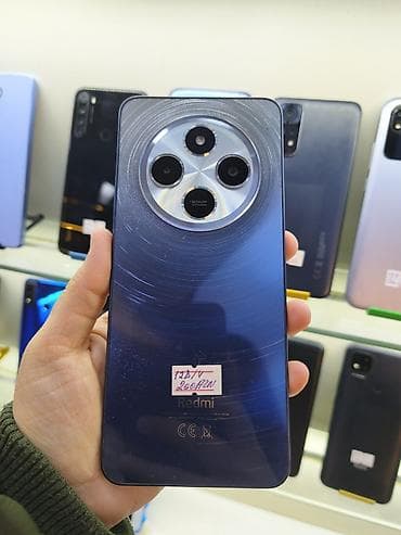 telefon qelemi: Redmi smartfon Xüsusiyyətlər: - Arxa kamera sistemi: dairəvi modul — 1