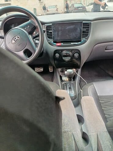 автомобиль фольксваген поло: Kia Rio: 1.5 л | 2010 г. Хэтчбэк — 6