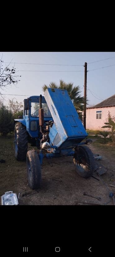 rengli işıq: Mavi rəngdə MTZ tipli təkərli traktor. Texniki xüsusiyyətlər və — 5