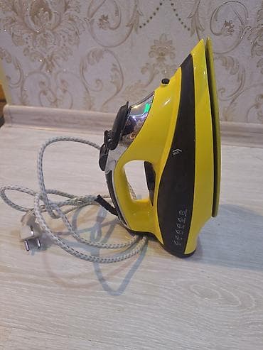 modem wifi sim: Buxarlı ütü – sarı/qara korpus, şnurla işləyən model. Xüsusiyyətlər — 3