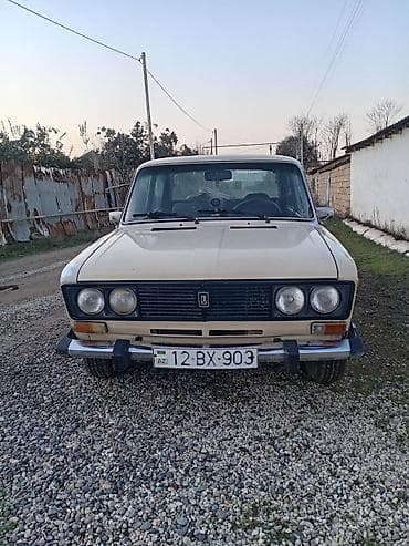 ucuz elektrikli avtomobil: VAZ 2106 sedan Xüsusiyyətlər: - Kuzov: 4 qapılı sedan, bej rəng - — 4