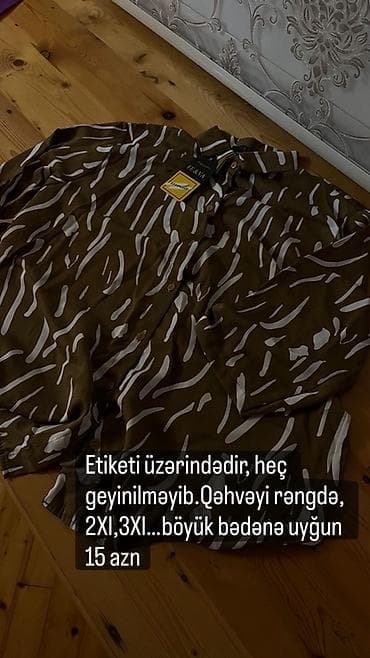 uzun paltolar: Qəhvəyi rəngdə, naxışlı uzun qol köynək. Üzərində etiketi var — 1