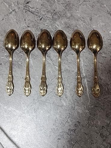 Столовые приборы: Qızıl tonlu süfrə ləvazimatı dəsti – 18ədəd Tərkibi: - 6 ədəd şorba — 10