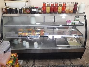 Mikserlər: İşlənmiş 3 qapılı Atlant Soyuducu Satılır, rəng - Qara, Təkərli — 2