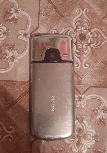 Lincoln: Nokia 6700 Slide, 2 ГБ, цвет - Серебристый, Кнопочный — 2