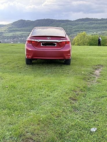 traktor satiwi: Toyota Corolla: 1.6 l | 2014 il Sedan — 4