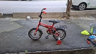 12 lik usaq velosipeti əla vəziyyətdədir hec bir problemi yoxdur usaq — 2
