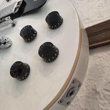 gitara temiri: Elektro-gitara Smiger L-G9 WH Simlərin sayı: 6 Üst: Ağcaqayın Qol: Gül — 3