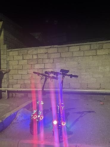 Elektrik skuter – güclü işıqlandırma və ikili amortizasiya -