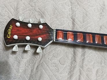 real gitara: Klassik gitara, Yeni, Ünvandan götürmə — 4