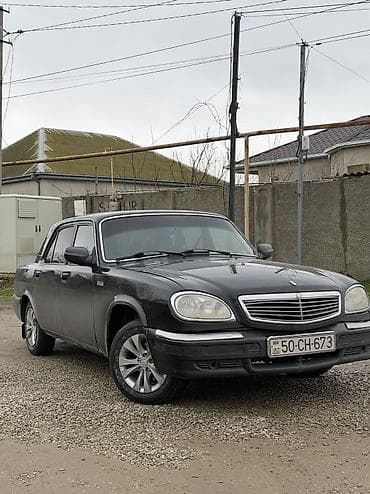QAZ 31105 Volga: 2.3 l | 2004 il Sedan