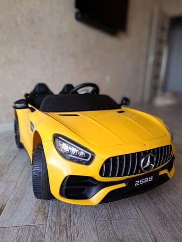 детский мотоцикл каталка: Uşaq üçün elektrikli ride-on avtomobil – sarı rəngdə sport kabriolet — 3