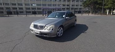 man tir: Mercedes-Benz E-Class: 2.7 l | 2003 il Sedan — 4
