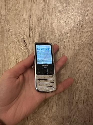 philips xenium x700: Nokia 6700 Slide, rəng - Gümüşü, Düyməli — 3