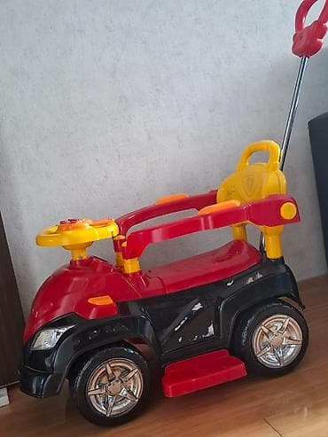 Uşaq üçün minik maşını – itələmə saplı və qoruyucu barmaqlıqlı model