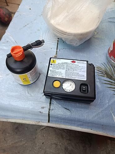 təkər kameri: Avtomobil təkəri təmiri üçün mini kompressor və təmir məhlulu seti - — 1