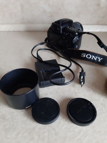 knopkalı: Fotoaparat Sony a500. Probeqi azdır. Şəkil çəkmək üçün knopkası — 14
