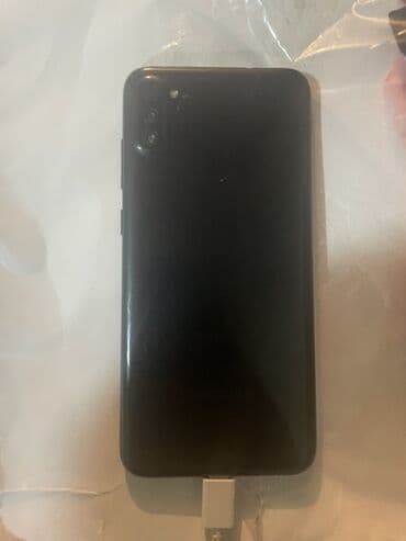 note 11 ekran: Samsung Galaxy A11, цвет - Черный, Отпечаток пальца — 1