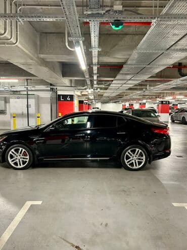 xrom diski: Kia Optima – qara rəng, sedan kuzov. Şəhərdaxili və magistral yollarda — 8