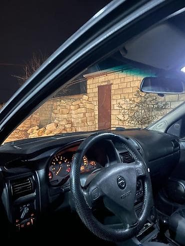 meqan masin: Opel Astra: 1.6 l | 1999 il 420000 km Universal — 5