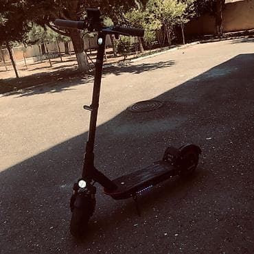 Elektrikli skuter – Toga T03P Xüsusiyyətlər: - Güclü ön LED fənər və