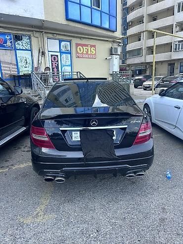 mercedes e280: Mercedes-Benz C‑Class sedan (W204) – qara rəng, AMG paketli görünüş — 5