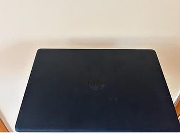 samsung mini notebook: HP noutbuk, qara rəngdə, klassik və işgüzar dizayna malik modeldir — 2