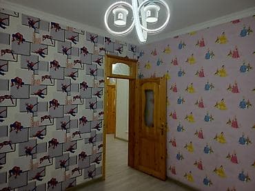 genclik kiraye ev: Uşaqlı ailələr üçün ideal, zövqlə tərtib olunmuş mənzil interyeri. - — 2